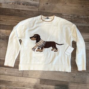 Calligraphie Cream Sweater with Dachshund wearing a scarf